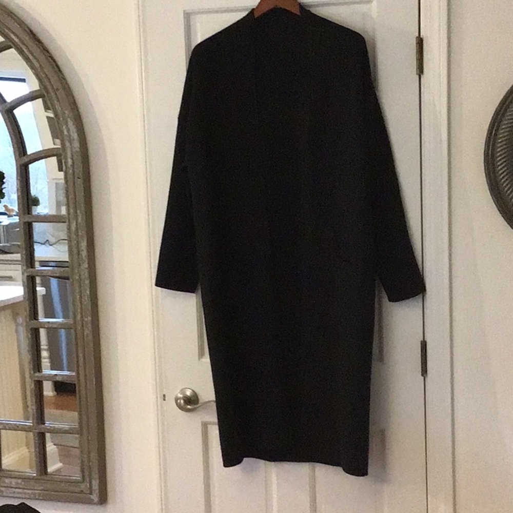 Classic Black Women's Sweater coat with two front pockets.